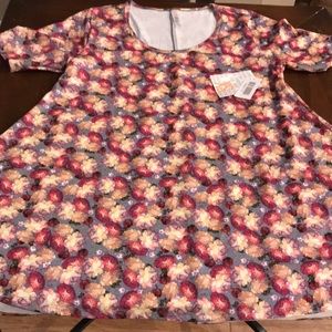 XS LuLaRoe Floral Perfect T with grey background.